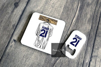 leeds fan gift. Tony yeboah. Yeboah print. leeds coaster leeds gift set. leeds fan art. This is a coaster and bottle opener gift set perfect for any Leeds fan. It shows a retro Leeds Kit with Yeboah 21 on the back, a kit from 95-96 season. This design celebrates the retro kits and iconic players.