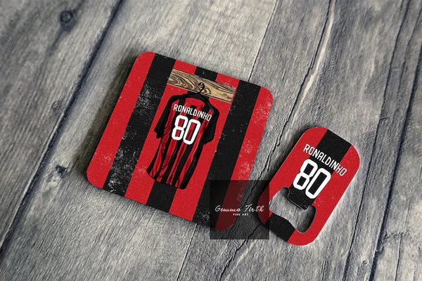 This is a coaster and bottle opener gift set perfect for any AcMilan fan. It shows a retro Milan Kit with Ronaldinho 80 on the back, a kit from 08-09 season. This design celebrates the retro kits and iconic players.